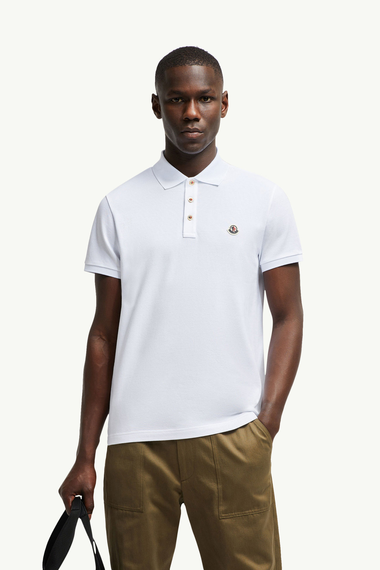 Polo in piquet di cotone con patch logato Uomo Bianco Ottico Moncler 0