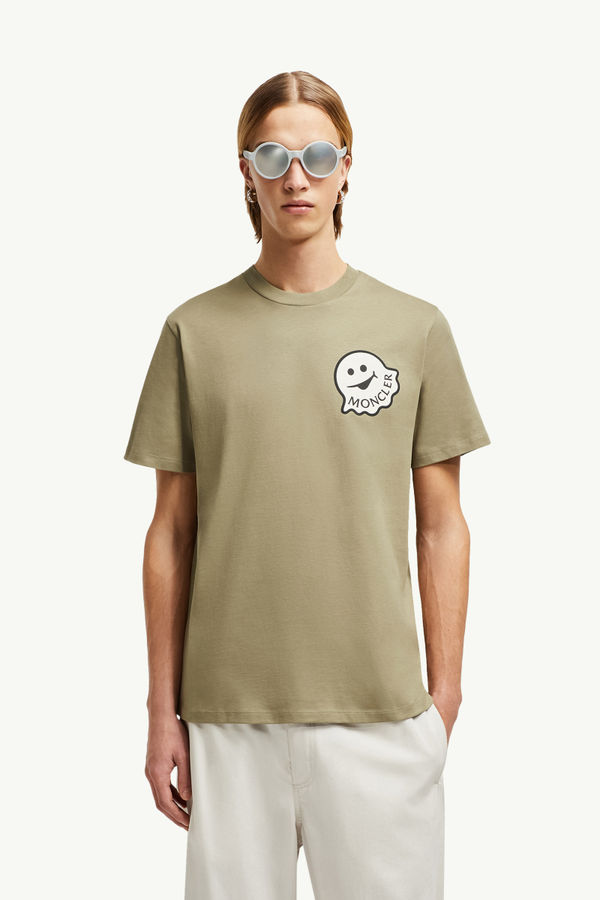 T-shirt in cotone con logo cartoon Uomo Verde Salvia Moncler 0