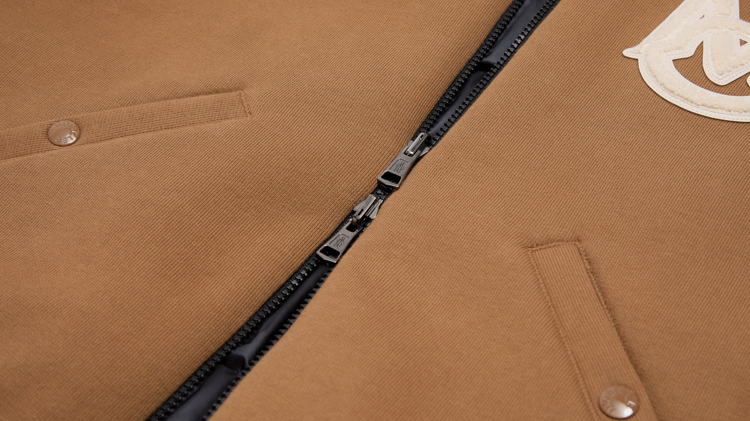 Slide 1 - product.feature.reversiblezip.title