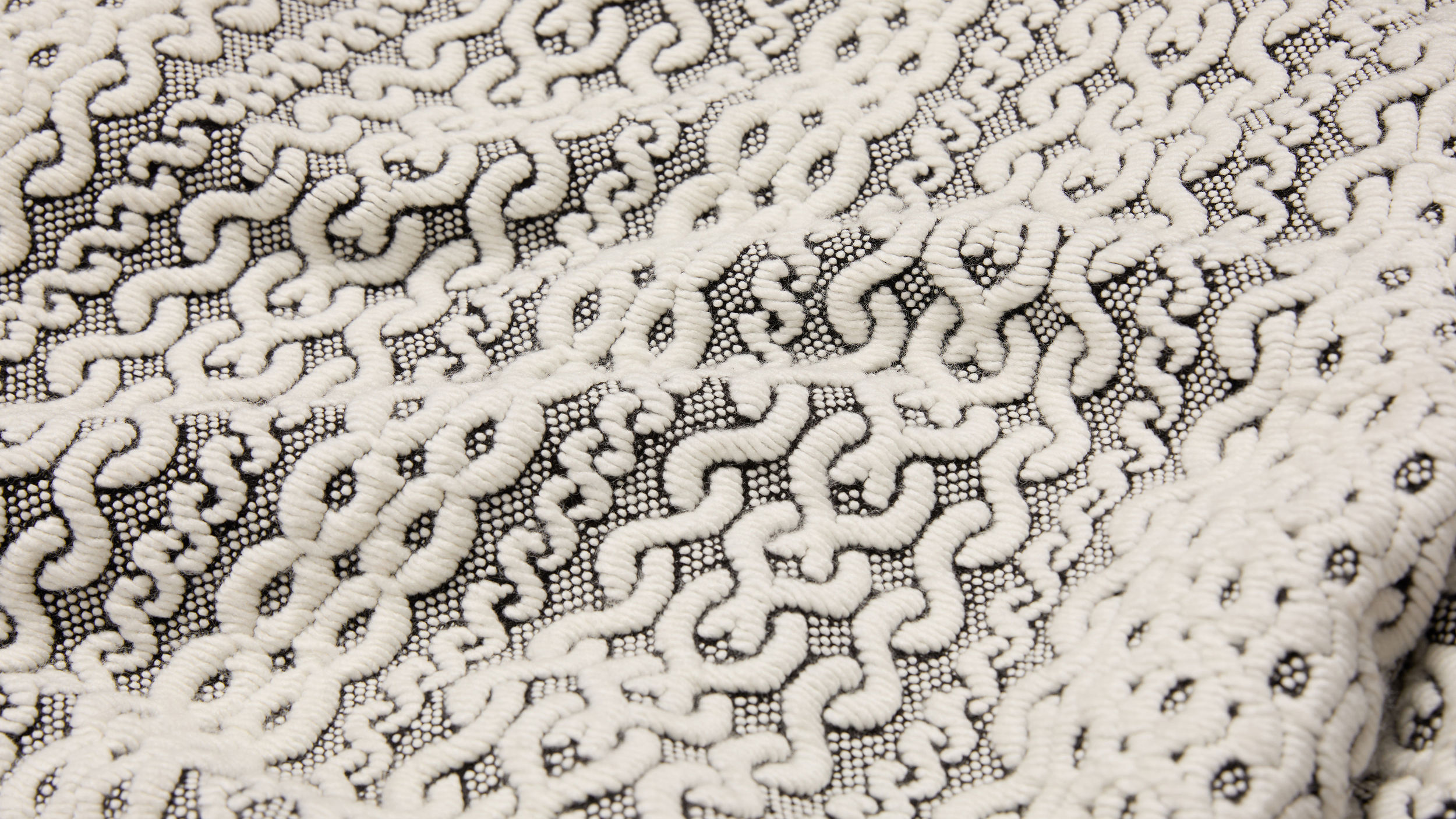 Slide 2 - Woven Motif