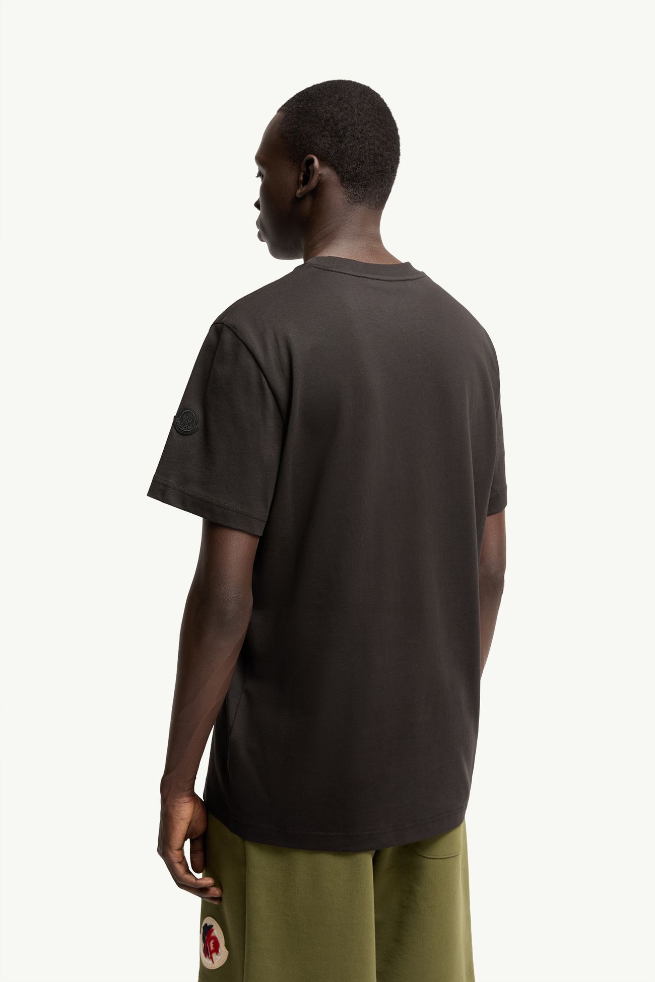 T-shirt in cotone con logo effetto schizzo Uomo Nero Moncler 4