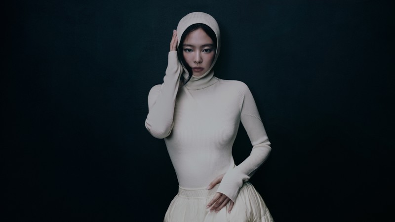 Moncler Re/Icons 2026, portrait of Jennie in a white ribbed hooded knit top.