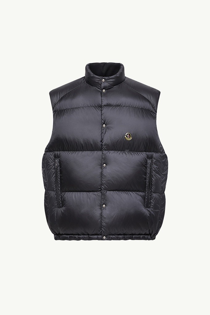 Moncler Re/Icons 2026, Tibb men's down vest in navy with stand collar, snap front and logo patch.