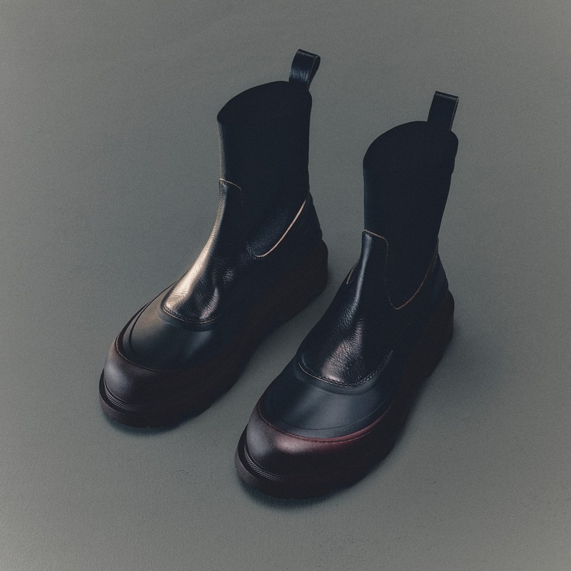 Moncler Men's and Women's Footwear: brown and black Chelsea boots, sole detail with logo.