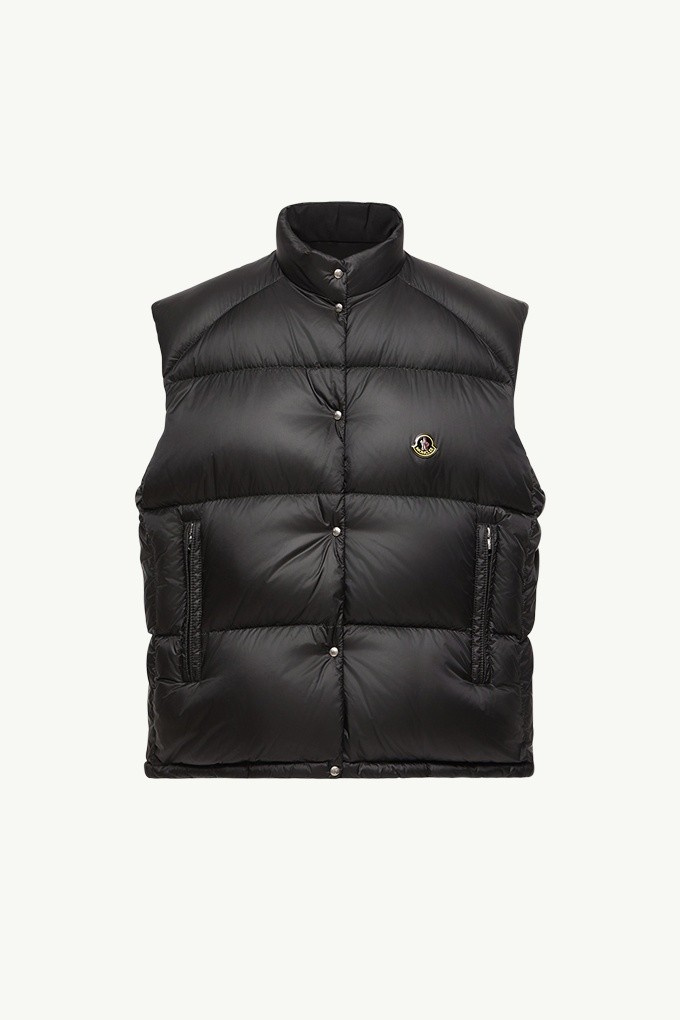 Moncler Re/Icons 2026, Tibb women's down vest in black with stand collar, snap front and logo patch.