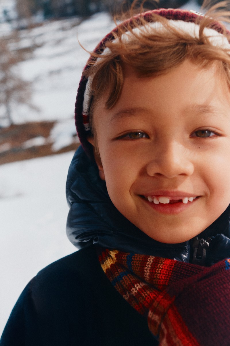 Moncler accessories for boys. Striped knit hat and multicolored striped scarf.