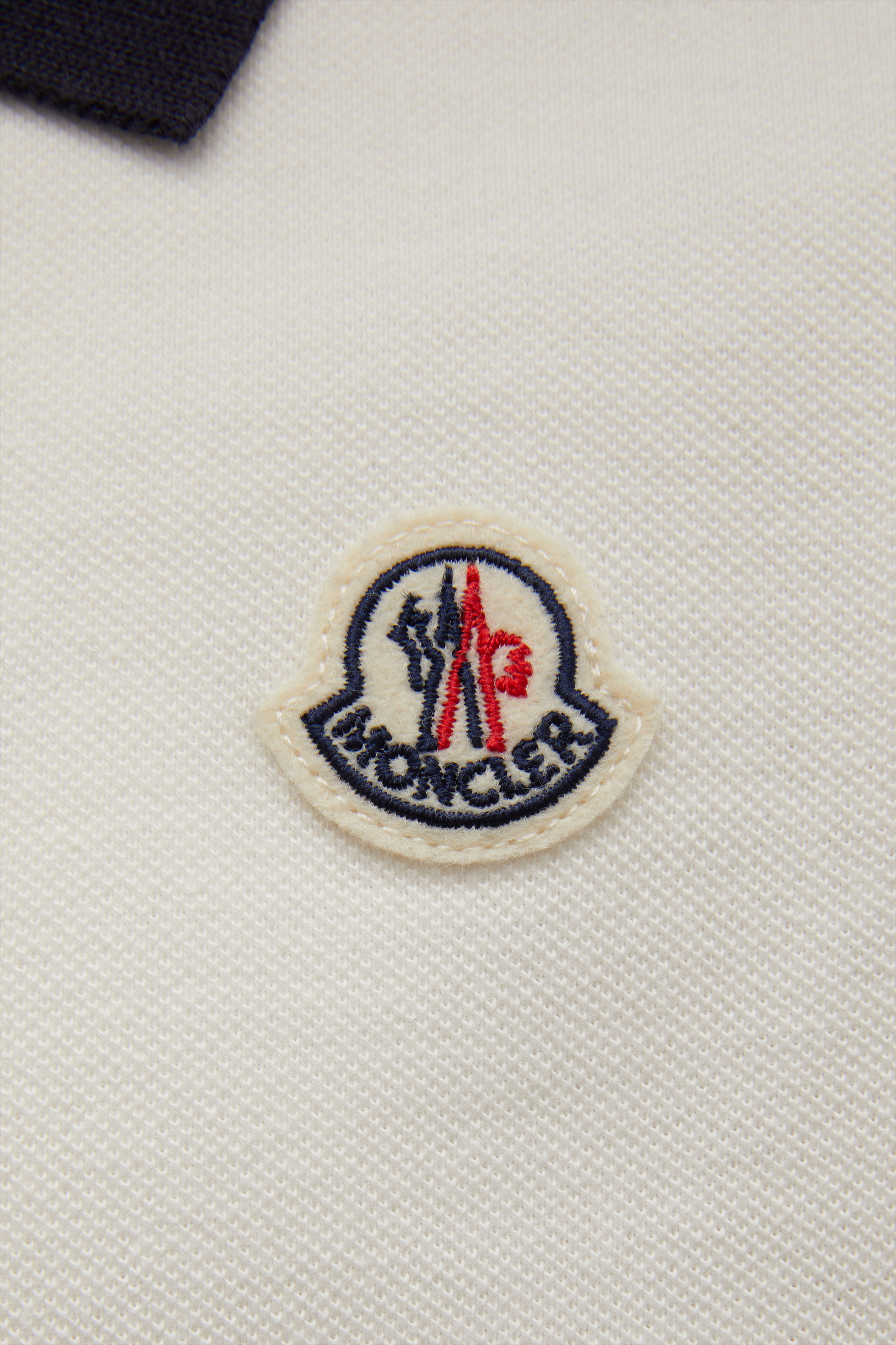 moncler white badge