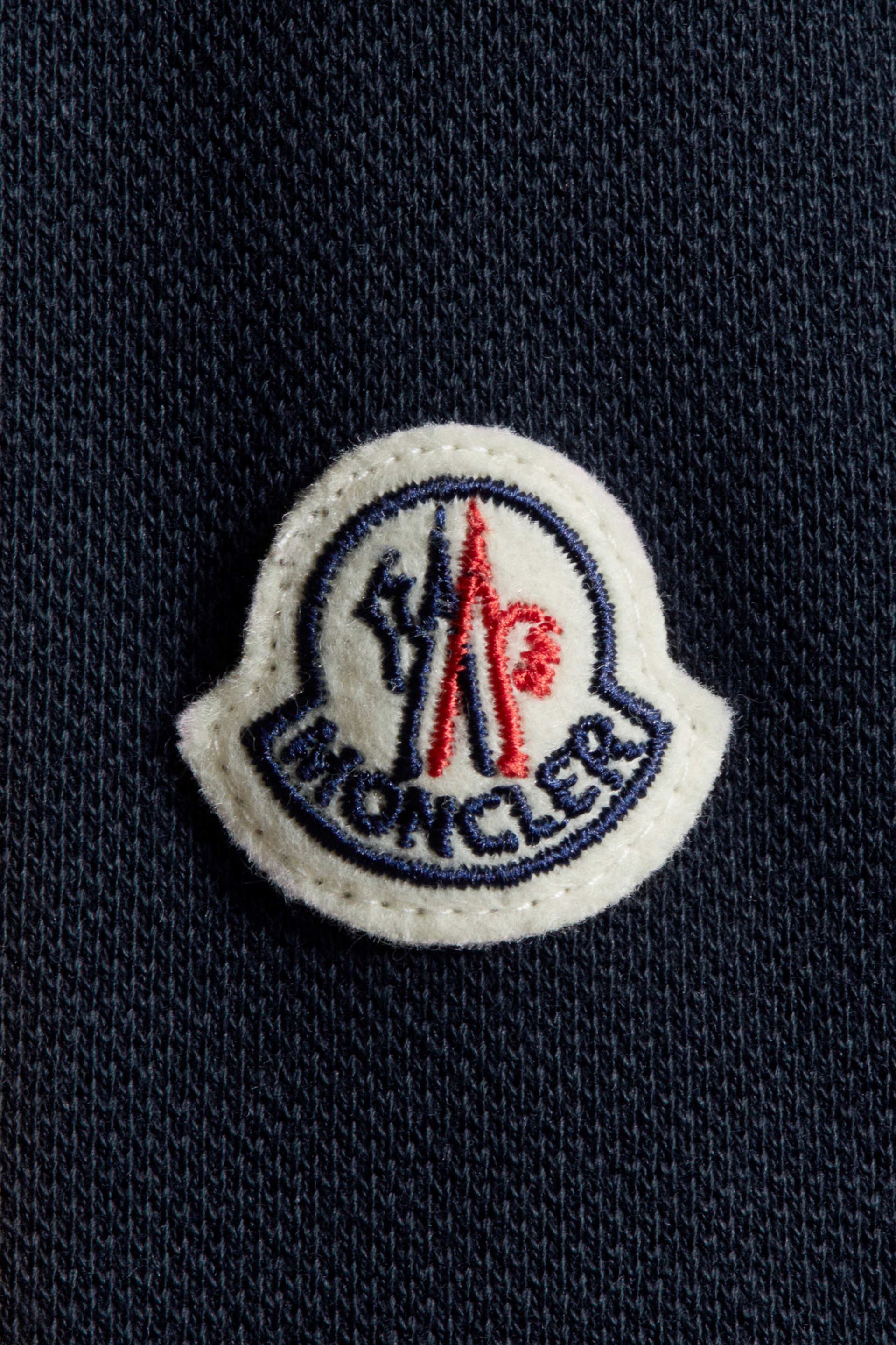 moncler badge on coat