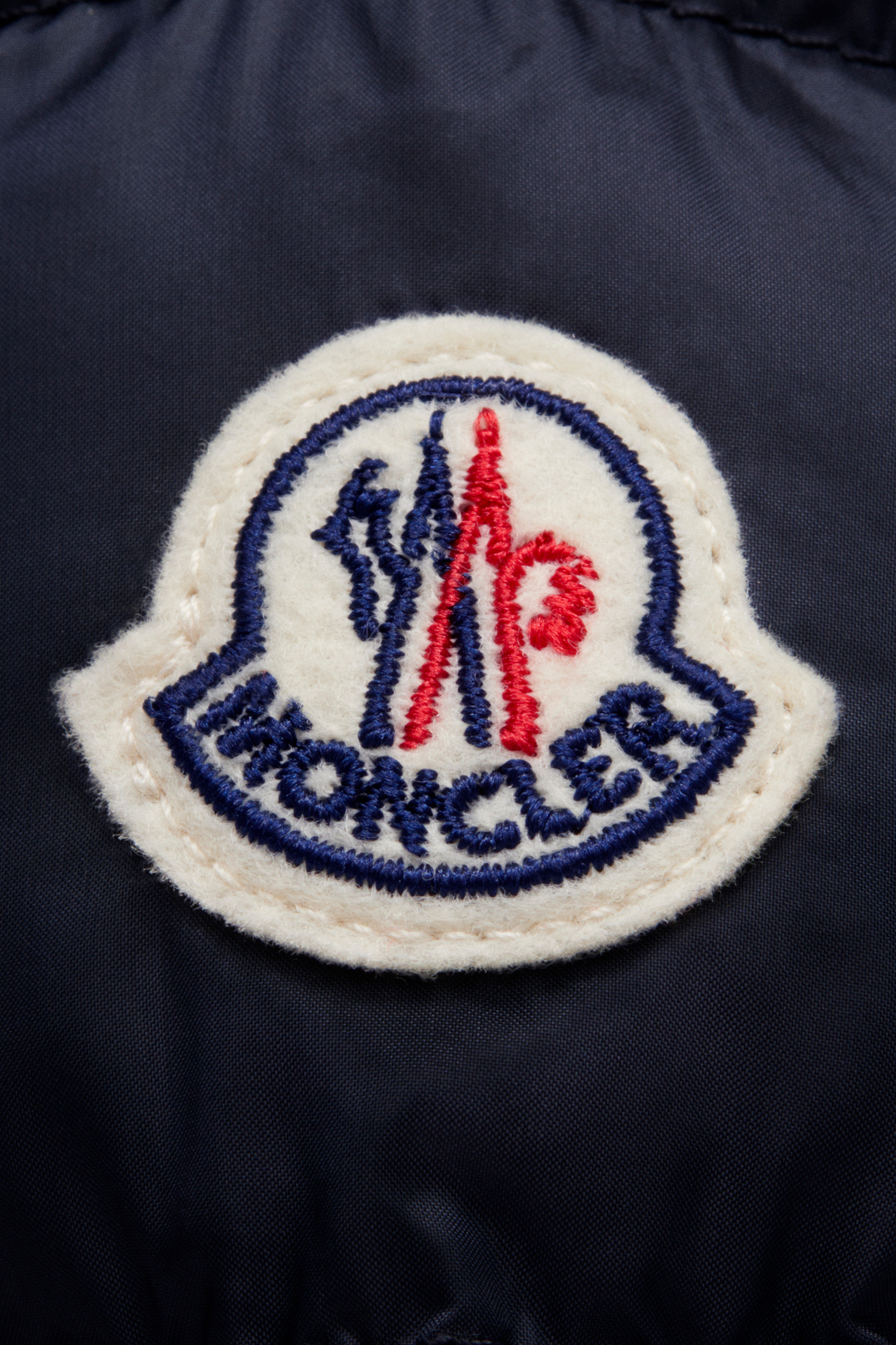 moncler badge on coat