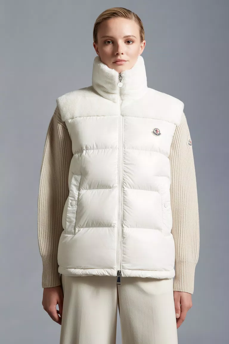 Lempa Down Vest by Moncler, vintage-inspired alpine down vest with faux fur.