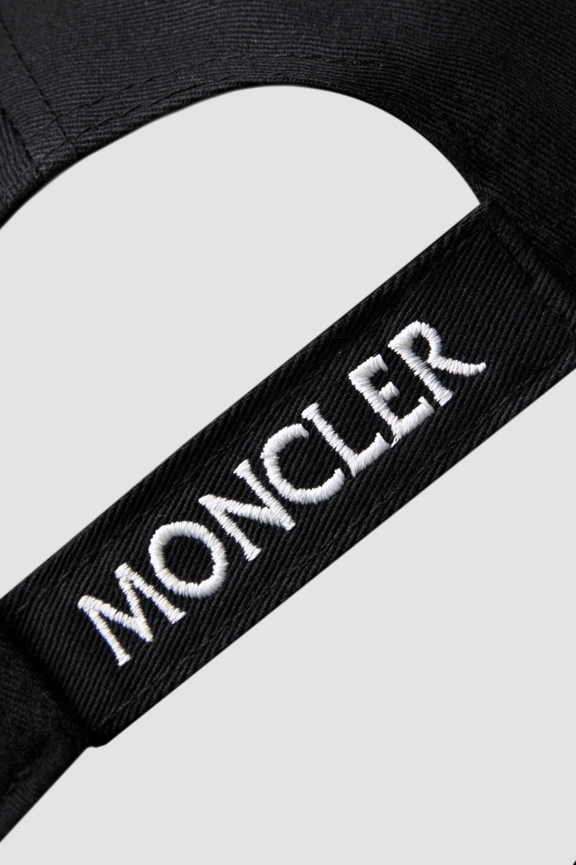 Moncler black hot sale logo