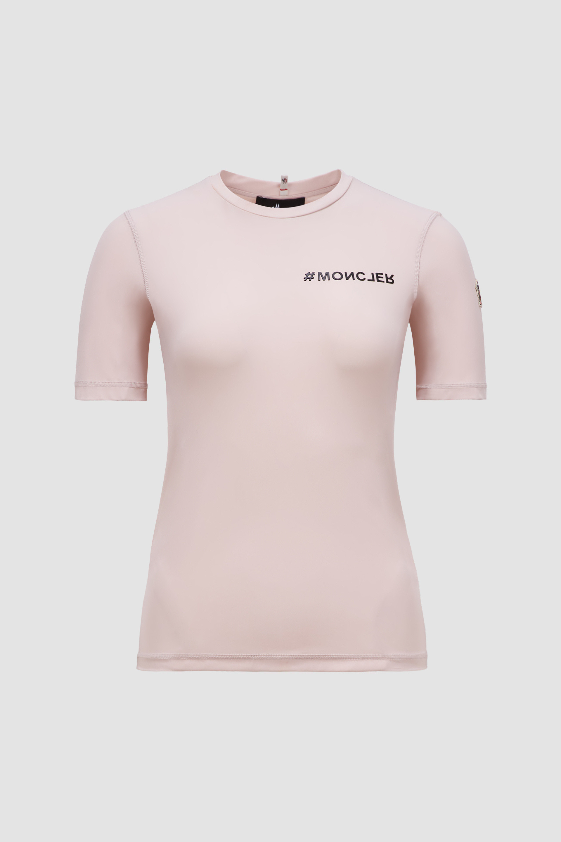white and pink moncler shirt